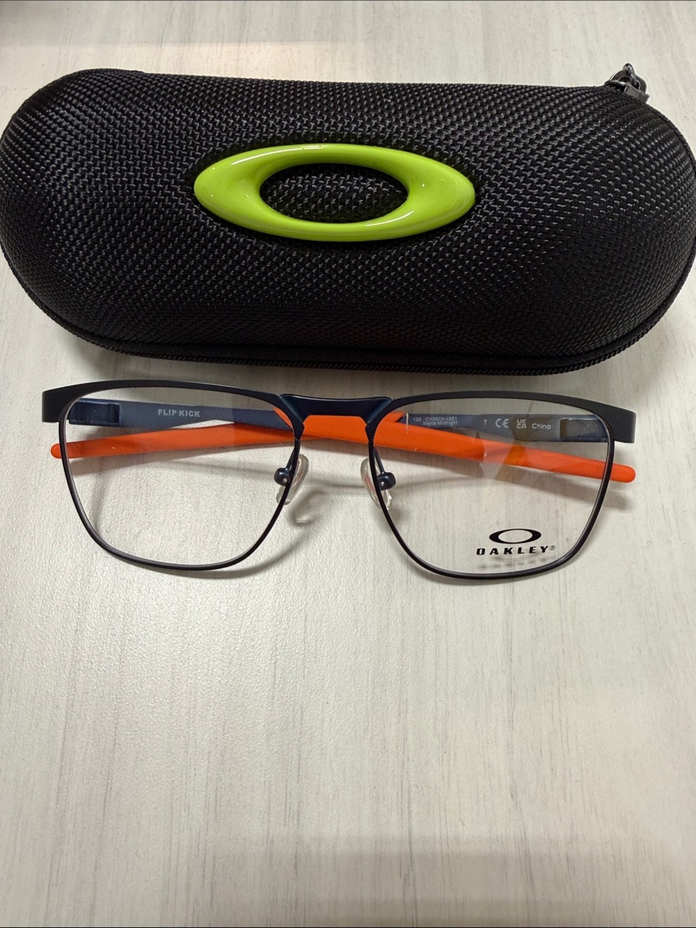 Oakley Flip Kick oy3003 Eyeglasses in Navy with Orange Temples. Youth size.